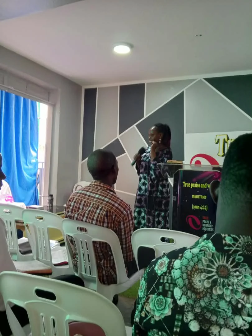 Woman speaking to seated church members