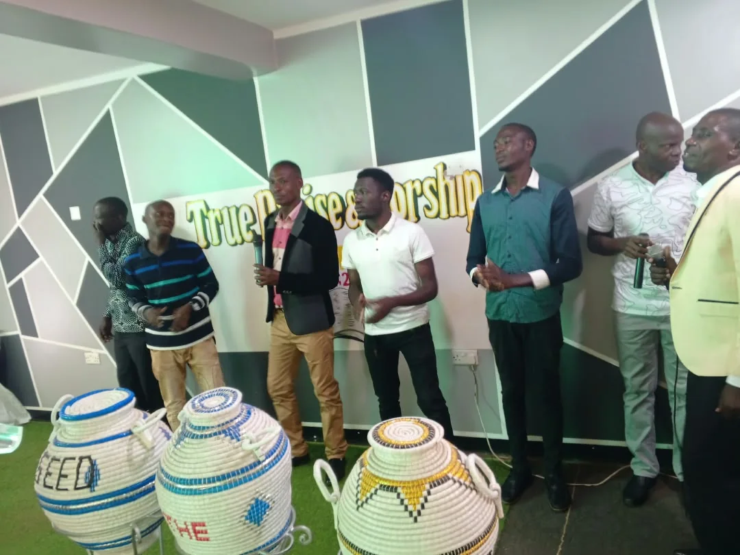 Church members standing together during worship